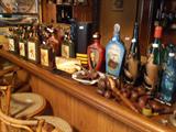 Beam and other collectible liquor decanters and bottles