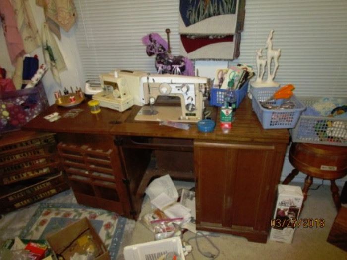 Sewing machine in cabinet (sorry for the mess).  Took a lot of cleaning to get to it.