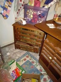 Salesman's sewing cabinet.  Bottom drawers needs repair.