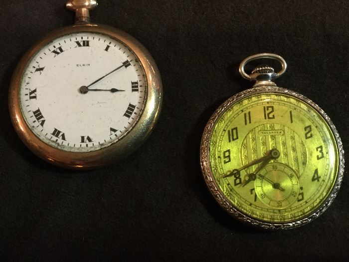 TWO POCKET WATCHES - ELGIN AND TAVANNES