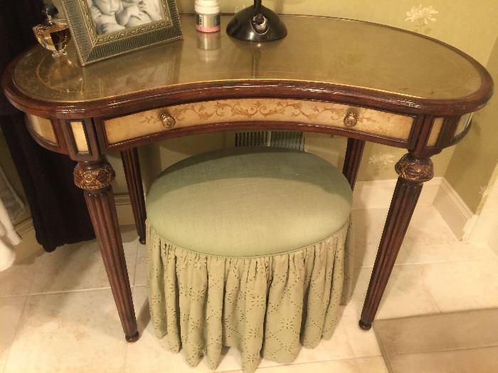 70. Theodore Alexander Louis Dressing Table w/ Antique Mirror Inset (40" x 23" x 40")                                             71. Skirted Oval Ottoman (22" x 17" x 20")
