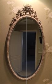 68. Pair of Cream Colored Carved Oval Beveled Mirrors (22" x 40") 
