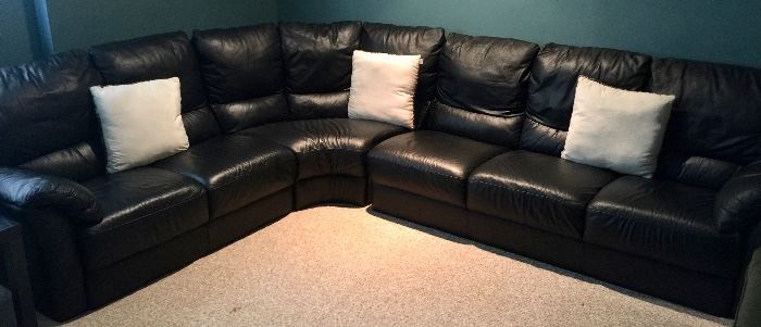86. Black Leather Sectional (117" x 90" x 33" deep x 35" h)