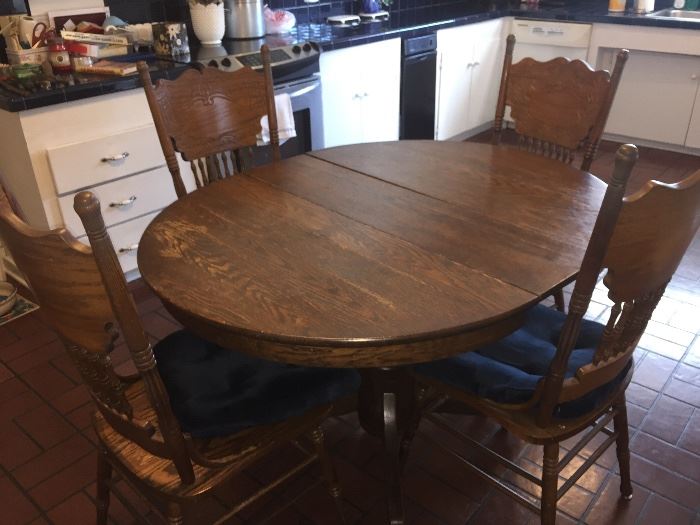 early oak table with matching early chairs