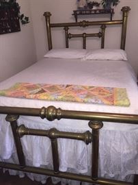 fantastic iron bed and do you see the hand crocheted bed spread? --we have several of them