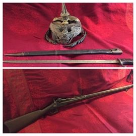 WW1 German helmet and German bayonet and scabbard and 
1886 model 1873 Springfield Trapdoor Rifle. 