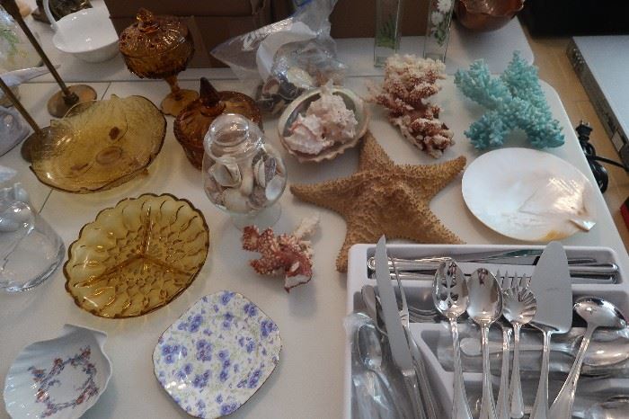 Incredible complete set of flatware.  Coral, starfish, shell serving dish.