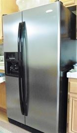 Whirlpool side-by-side refrigerator. Pick-up at end of sale