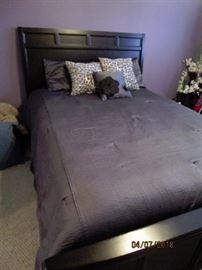 Queen size bed (bedding not included)
