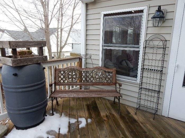 Bench, Rain Barrel and in the 3 season room you go to more treasures.