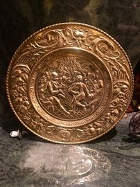 Brass high relief illustrative wall plaque