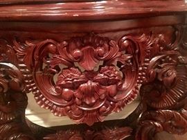 Detail of carvings on baroque curio