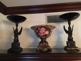 Pair of bronze statues with marble bowls