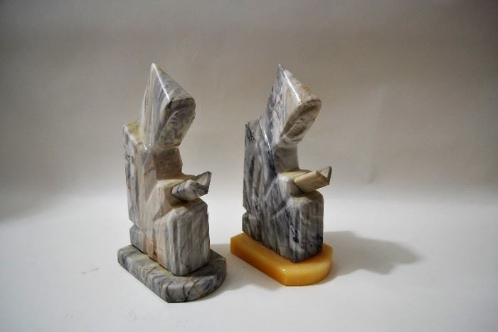Pair of alabaster bookends depicting monks