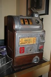 3 Antique Slot Machines