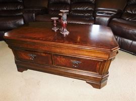 Rising top coffee table with side drawers