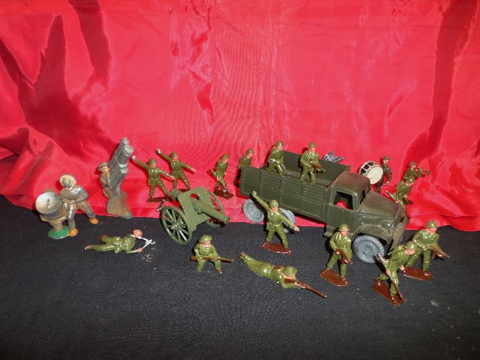 there are lots of vintage toys & games, including these vintage lead soldiers