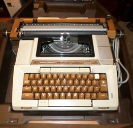 vintage Smith Corona typewriter - there's also a large amount of brand new vintage typewriter ribbons & other supplies, plus several more typewriters