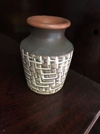 lots of handmade pottery pieces 