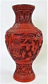 Antique hand carved Red Chinese Cinnabar Vase | Decorated with detailed floral designs | In excellent condition. No chips or cracks. Measures almost 13 inches in height. 
