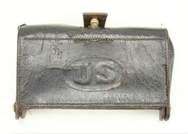  Genuine Civil War Era US Cartridge Box | Military issue cartridge box. The pouch shows the oval US military seal, and has brass hardware. The cartridge box was adopted as standard garrison equipment in 1879, and was used until the Spanish American War. The cartridge box is in very good ++ condition. The piece measures approx. 7.5" x 4.5" 