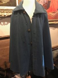  Rare Authentic Civil War Uniform Great Coat / Cape | This antique wool slate blue military cape has brass buttons with a union armor on an eagle | The thick wool cape has no liner, which was not uncommon | Shows signs of wear and scattered moth damage consistent with age and use | Overall Very good condition for uniform used in Civil War | Appears Genuine and NOT an aged reproduction | Union Soldiers were issued great coats and/or capes during the winter months | Very common for Confederate soldiers to wear union coats or remnants of union uniforms | From a prominent Civil War Collection 
Dimensions: 60" x 42" x 12" 