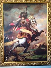 A large oil painting after Théodore Géricault (1791 – 1824) "The Charging Chasseur" | Oil on Canvas | Signed by the artist in the lower right of the canvas | Dimensions: 48" H x 36" W | The Charging Chasseur, or "An Officer of the Imperial Horse Guards Charging" is a early 19th century oil painting (1812) by the French painter Théodore Géricault, portraying a mounted Napoleonic cavalry officer, ready to attack. The painting represents French romanticism and has a motif similar to Jacques Louis David's Napoleon Crossing the Alps, but non-classical characteristics of the picture include its dramatic diagonal arrangement and vigorous paint handling. In The Charging Chasseur, the horse appears to be rearing away from an unseen attacker. The painting was Géricault's first exhibited work. Géricault would continue to move away from classicism, as exemplified in his masterpiece The Raft of the Medusa (1818–19). The turning figure on a rearing horse is derived from the large early Rubens Saint 