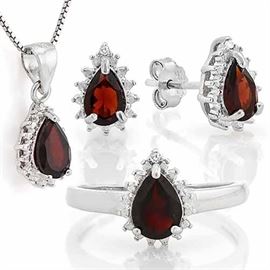 3.2 Carat Garnet Parure 925 Sterling Silver with 4 teardeop stones set in a matching ensemble set consisting of a ring, necklace and pendant necklace