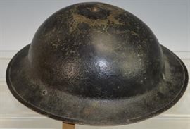 An American doughboy Helmet from WW1. The chinstrap is still intact and the paint is still complete. Helmet was unit marked (Co. A 3rd Engineers Oahu T.H.) by soldier that wore it. This helmet was used by a soldier that was later stationed in Oahu. At that time, the 3rd Engineers was responsible for building the majority of the military installations on Oahu Island in Hawaii. Besides being Unit Marked, the Helmet is also marked 4A. 