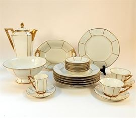 A gorgeous antique French Jean Pouyat Limoges China Set | 19th Century | Pattern POY254 with gold tone trim | This set includes dinner plates, soup bowls, teacups, coffee cups, saucers, serving bowl with handles, a serving bowl with a pedestal base, and tall pitcher | Each piece is hallmarked with a "J.P" over an "L" and "France" and also marked "J. Pouyat Limonges" | Very Good condition, lid on pitcher has been repaired | Dimensions: 12.0" W x 12.0" H x 12.0" D (box sizes). The Pouyat family has an important place in the history of French pottery and porcelain. Pierre Pouyat established a faience manufacturing company at Saint-Yrieix around 1760. His son François Pouyat, who owned clay deposits and clay works in the Haute-Vienne region, partnered with < Laurentius Russinger in Manufacture de la Courtille >, a hard paste manufaturing business at the Locre factory in Paris from 1795 to 1800. In 1800 François emerged as the sole owner of La Courtille, and his sons, Leonard and Jean-Bapti