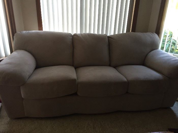 Nice taupe sofa,in Ultra suede, $250.00    84 in. wide., as new condition.