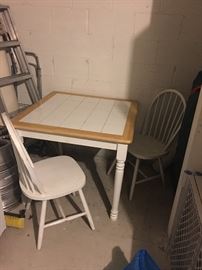 white table and two chairs