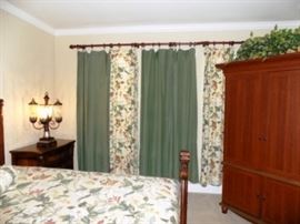 Drapes and Curtain Rod. Beautiful lamps.