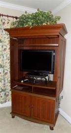 Sony TV inside cabinet