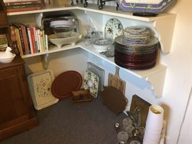 Chargers, cutting boards, chandelier, cookbooks