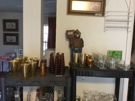 Smokey the Bear bank along with lots of glass 