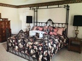 Wrought Iron King Head & Foot Boards w/partial canopy.  Adjustable King Mattress in very good condition.  Two Drexel Night Stands.  Two Lamps