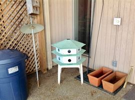 Bird houses and planters.