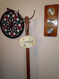 Dart board; hat rack