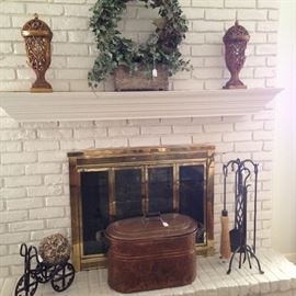 Mantel decor; great copper vat; black fireplace tools