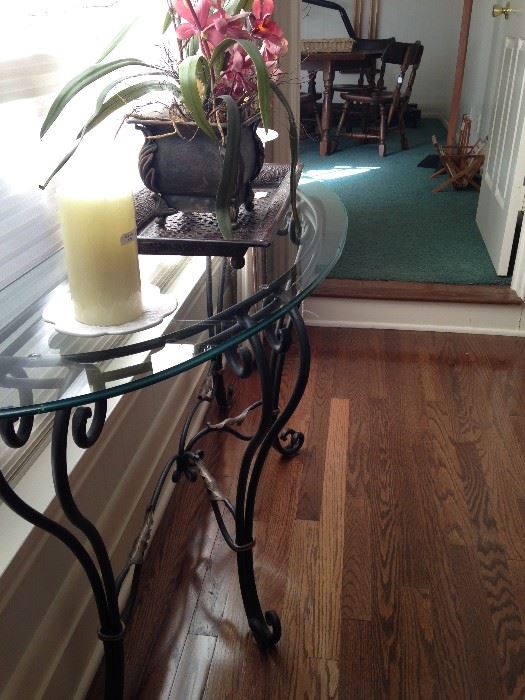 The side table matches this demilune glass top sofa/entry table.