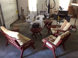 Garage has tools outdoor set and grills