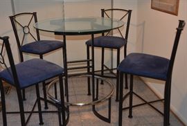 Tall dining table set with four chairs