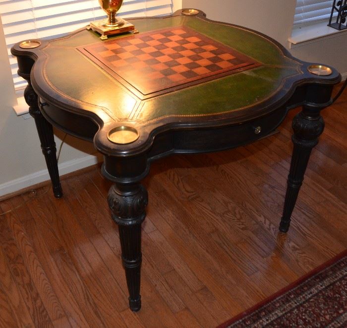 Game table.  Chess board flips over to match green leather.