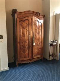 Huge armoire 94 1/2 " H X 56 1/2 " W X 23 D. Burled bookend fruitwood armoire doors. Totally outfitted for modern use.