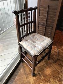 19th century English chairs with a spindle back and bun foot in front