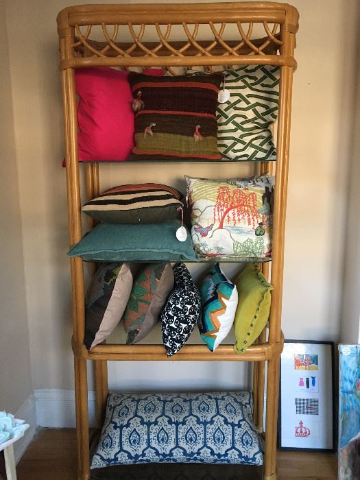 tons of pillows and great storage pieces like this bamboo and glass shelf!