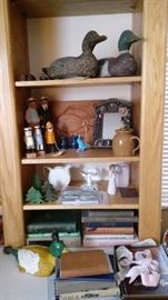 Duck decoys, books, fishing themed items