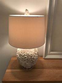 One of two Beautiful lamps made of shells in a floral pattern