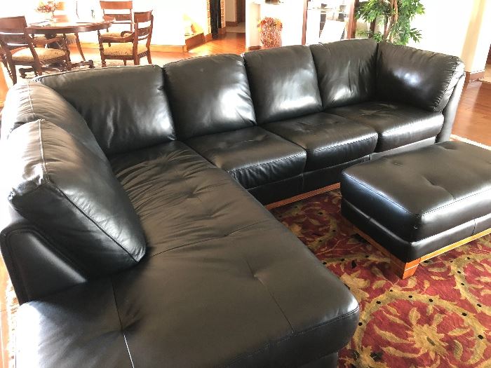 So compy black leather sofa with ottoman